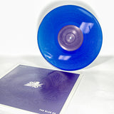 Vinyl album cover for Bayside "The Blue EP" on a white background. Cover is Blue with a Mandala. White bird on a flower centered. White Text in the corners "Bayside" & "The Blue EP". Vinyl is Transparent Blue.