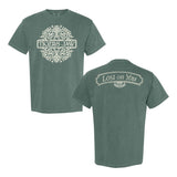 A sage green Tigers Jaw Comfort Colors T-shirt with ornate white band text on the front. The back features a crisp white "Lost on You" banner above a small decorative emblem.
