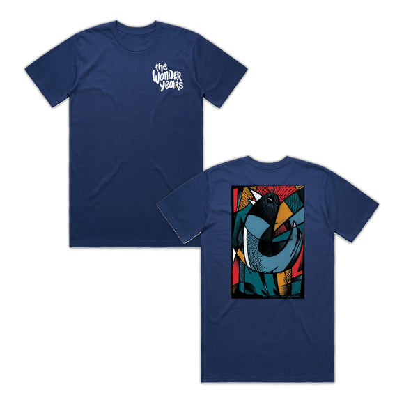 A navy blue The Wonder Years Staple T-shirt with their logo on the front left chest and a vibrant abstract bird design with geometric shapes and bold lines on the back—a standout printed tee.