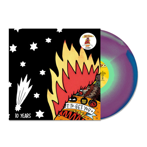 A Limited Edition Neck Deep vinyl with a purple and green swirl design is partly inside its cover, which shows a cartoon fire, stars, and comet on black with 
