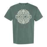 A green Tigers Jaw Comfort Colors tee with an exclusive ornate white circular design and TIGERS JAW boldly printed in a rectangular frame at the center.