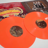 Vinyl Album cover. All Time Low - Don't Panic: It's Longer Now! Album cover shows band taking on a horde of zombie like creatures with UFO's in the store. Double Vinyl - Orange