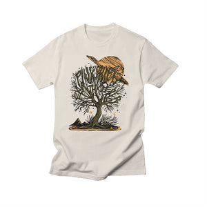 Pinkshift off-white Comfort Colors t-shirt with an exclusive print: a leafless tree with surreal black branches, set against a large orange ringed planet for a cosmic, mystical vibe.