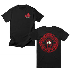 Black t-shirt on a white background. Front shows a red bird on a flower in red over white text "Bayside". Back print shows a big red Mandala with a white bird on a flower centered. 