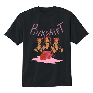 image of a black tee shirt on a white background. tee has full body chest print. the top has pink print that says pinkshift. below are three teddy bears with red wigs sitting in front of a pink human heart