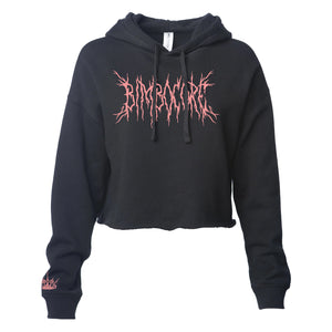 Black cropped pullover on a white background. Metal Text in red "Bimbocore". Right sleeve has a crown in red around the wrist. 