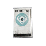 White Cassette on a white background. All Time Low "Future Hearts". Blue circle that contains a heart and eyeball. Album Cover only