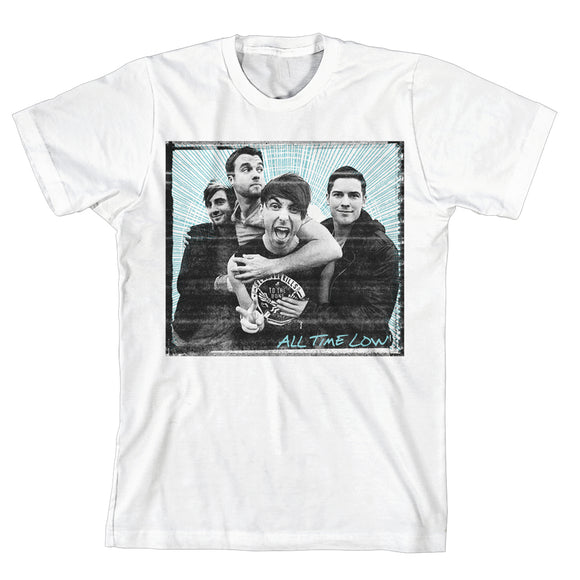 White t-shirt on a white background. Band photo on the chest within a square with a blue striped background. All Time Low in blue text in the lower left hand corner