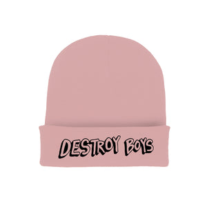 Pink winter cuffed beanie on a white background. Black embroidered text reads "Destroy Boys"