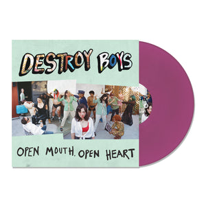 Vinyl album cover for Destroy Boys "Open Mouth, Open Heart" on a white background. Vinyl is purple. Collages of images in between text of Destroy Boys & Open Mouth, Open Heart. 