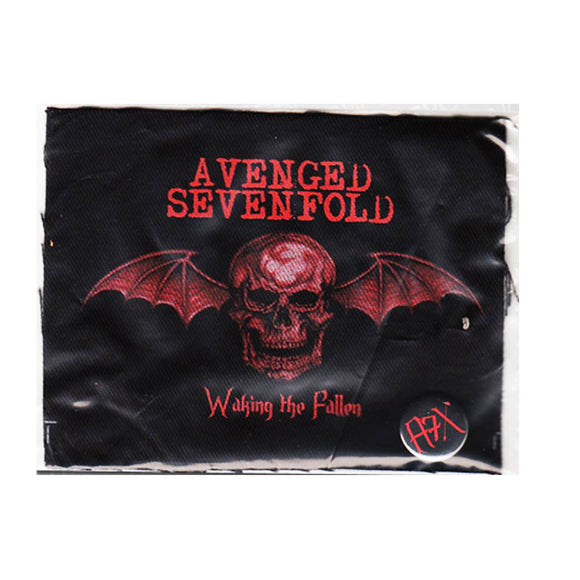 Pin & Patch set on  white background. Patch has a red skull with bat wings with text Avenged Sevenfold & Waking The Fallen in red. Pin has red text A7X