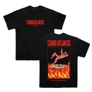 Black tee on a white background. Stand Atlantic f.e.a.r. printed in red on the front chest. Back print has Stand Atlantic in red print above an image of a devil in a red & white suit hovering above a pit of fire