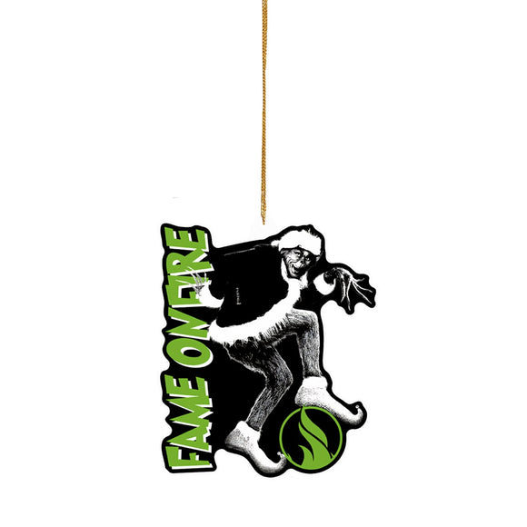Acrylic ornament that shows the Grinch with green text Fame on Fire, along with the Flame logo. 